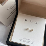 tiny white diamond studs