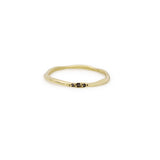 thin wavy band with 3 black diamonds