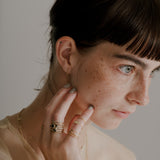 thin wavy band with black diamonds