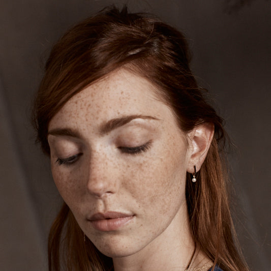 blanca monrós gómez | curved pearl bar studs