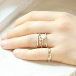 blanca monrós gómez | thin wavy diamond band