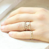 blanca monrós gómez | thin wavy diamond band