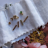 dainty diamond bar studs with black diamonds