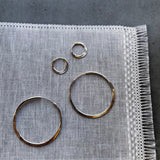 Silver endless hoops