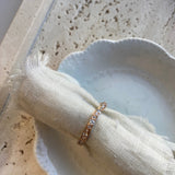 thick wavy band rose gold with diamonds