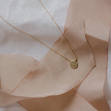 pavé flat seed necklace